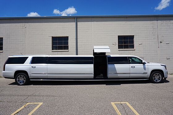 side view of a white limousine