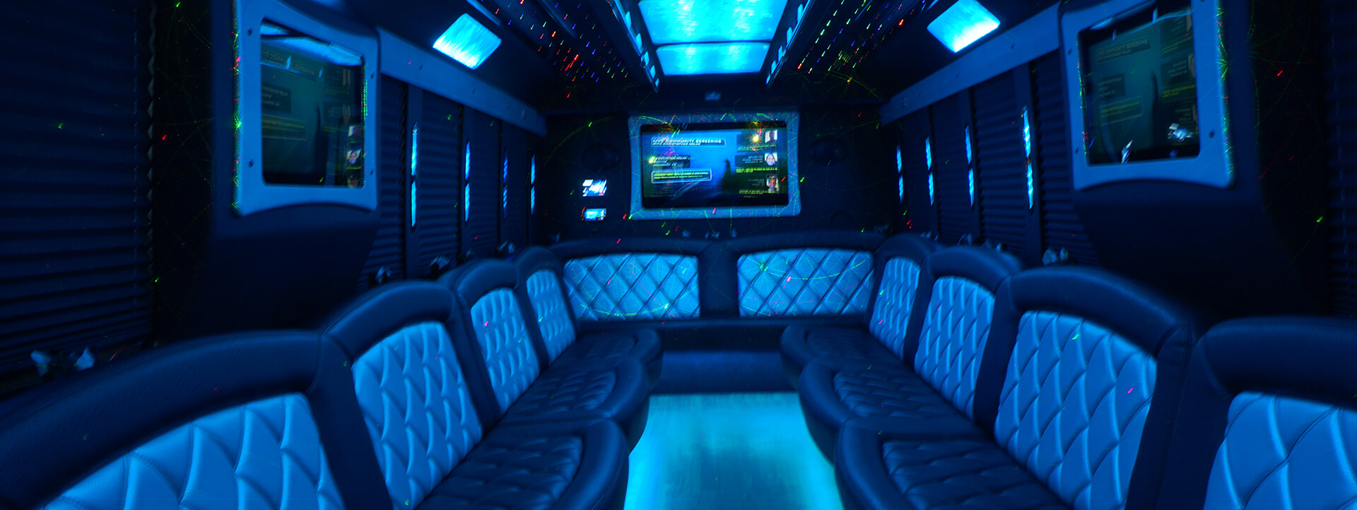 multiple TV screens inside a party bus rental